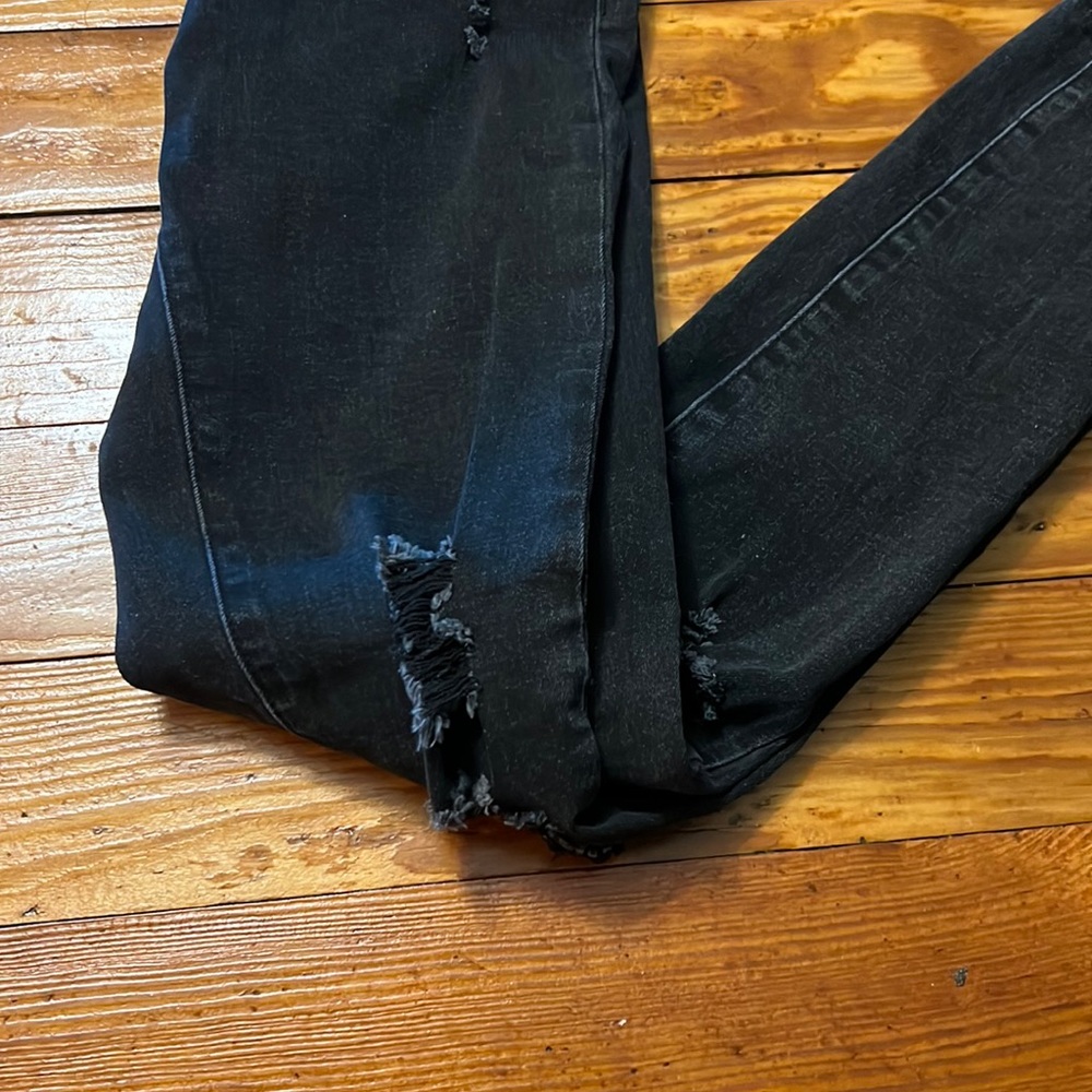 Black ripped knee jeggings size 27”